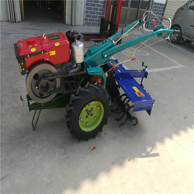 22HP trattore condotto a piedi di camminata della ruota del trattore agricolo due con l'aratro a disco
